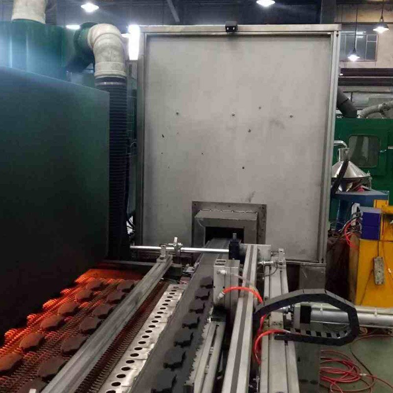 Линия электростатического распыления тормозных колодок